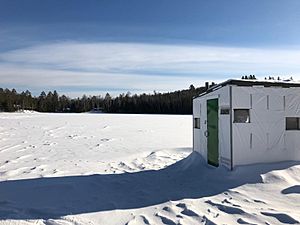 Ice fishing hut on Little Papineau Lake