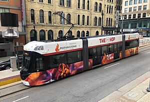 Milwaukee Hop streetcar 02 at Wisconsin Ave northbound stop, on Milwaukee St (2022)
