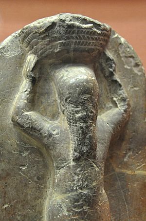 Detail of a stone monument of Shamash-shum-ukin as a basket-bearer. 668-655 BCE. From the temple of Nabu at Borsippa, Iraq and is currently housed in the British Museum
