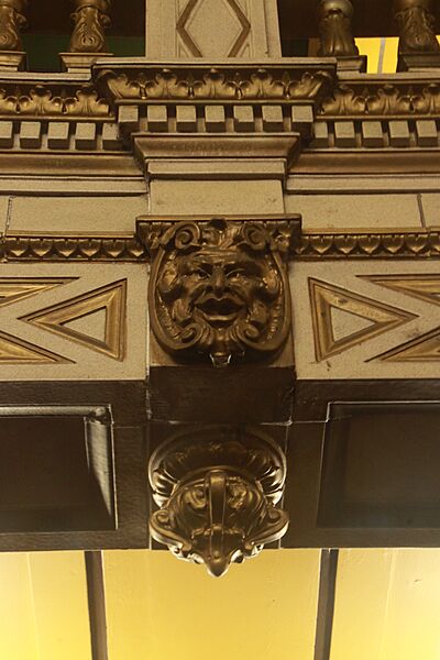 Face in the moldwork