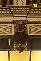 Face in the moldwork