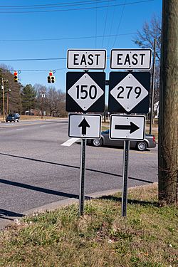 Directional signs of NC 150 and NC 279, in Cherryville