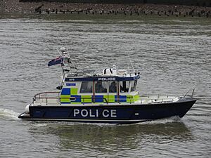 POLICE BOAT RIVER THAMES