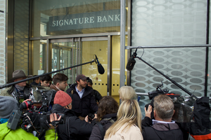 Signature bank storefront (39th & Madison) reporters swarming