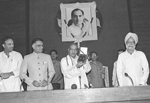 The Prime Minister Shri P.V. Narasimha Rao releasing an onerupee commemorative coin on late Shri Rajiv Gandhi former prime Minister, on the occasion of his first death anniversary in New Delhi on May 21, 1992