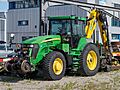 John Deere 7920 mit gleisbauspezifischen Anbaugeräten