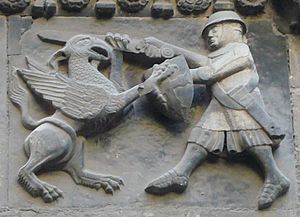Relleu porta Sant Iu esquerra