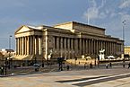 St George's Hall, long neo-classical building with multiple portico sets.