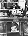 Stanley Tretick photo of John F. Kennedy Jr. in desk