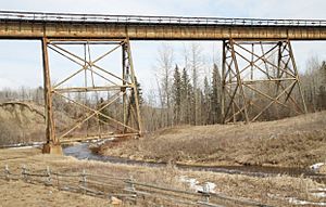 Sturgeon River flows under the Magnolia railway bridge west of Isle Lake, Alberta