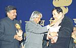 The President Dr. A.P.J. Abdul Kalam presenting the Dada Saheb Phalke Award for the year 2002 to noted film actor and director Shri Dev Anand for outstanding contribution to the growth and development of Indian cinema at the 50th.jpg