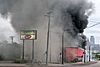 A fire burns at maX it PAWN in Minneapolis, Minnesota on Friday morning. (49948399113).jpg