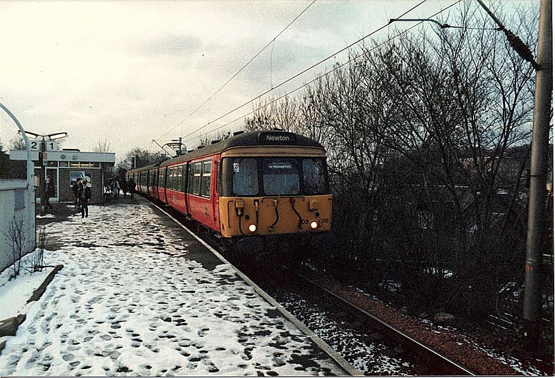Class 303 016 at Langside