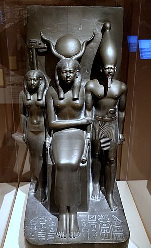 King Menkaure and two goddesses, plaster cast of original in Museum of Fine Arts, Boston, Egypt, Giza, Valley Temple of Menkaure, Dynasty 4, c. 2490-2472 BC - Harvard Semitic Museum - Cambridge, MA - DSC06126