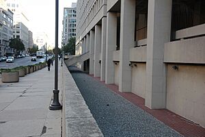 Looking east at dry moat along E Street NW - J Edgar Hoover Building - Washington DC - 2012
