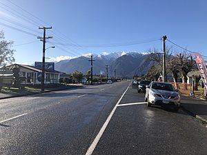 State Highway 6 running through Whataroa, with Mount Adams in the background