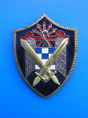 Escudo de las Milicias Universitarias