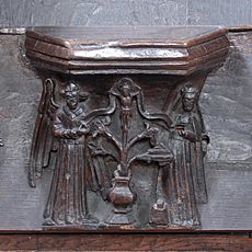 Lily crucifix misericord in Tong church, Shropshire