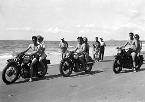 Motor bikes on Tannum Beach in sports organised by the Tannum Progress Association, June 1947