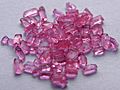 Small translucent, pink-coloured crystals a bit like the colour of candy floss