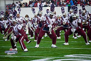The Marching 101 Band performing at Halftime in 2024