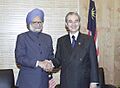 The Prime Minister, Dr. Manmohan Singh with the Prime Minister of Malaysia Mr. Abdul Haji Ahmed Badawi at Kuala Lumpur on December 12, 2005