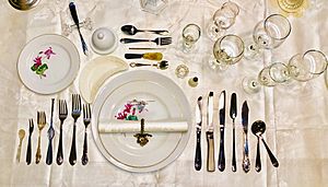 13 course table setting American overhead view