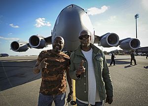 Dave Chappelle and Donnell Rawlings stand in front of a C-17 Globemaster III (32666816002)