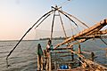Fishermen on Chinese Fishing Nets Cochin India