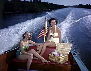 Lois Duncan Steinmetz (left) and Polly Gaines in a motorboat Sarasota, Florida