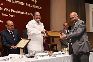 M. Venkaiah Naidu presenting Professor N.R. Madhava Menon, Best Law Teacher Award for 2018 to Prof. R. Venkata Rao, Vice Chancellor of National Law School of India, Bengaluru