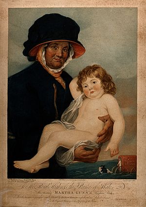 Martha Gunn, a Brighton bather holding a small child that sh Wellcome V0017100