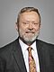 Official portrait of Lord Collins of Highbury crop 2, 2019.jpg