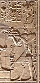 Ptolemy XII making offerings to Egyptian Gods, in the Temple of Hathor, Dendera, Egypt