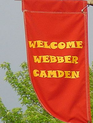 Banners hanging from streetlights welcome visitors to the Webber-Camden neighborhood