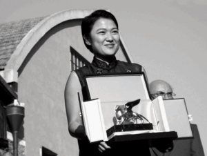 Zhang Xin awarded 'Special Prize at the 8th International Architecture Exhibition of la Biennale di Venezia in 2002